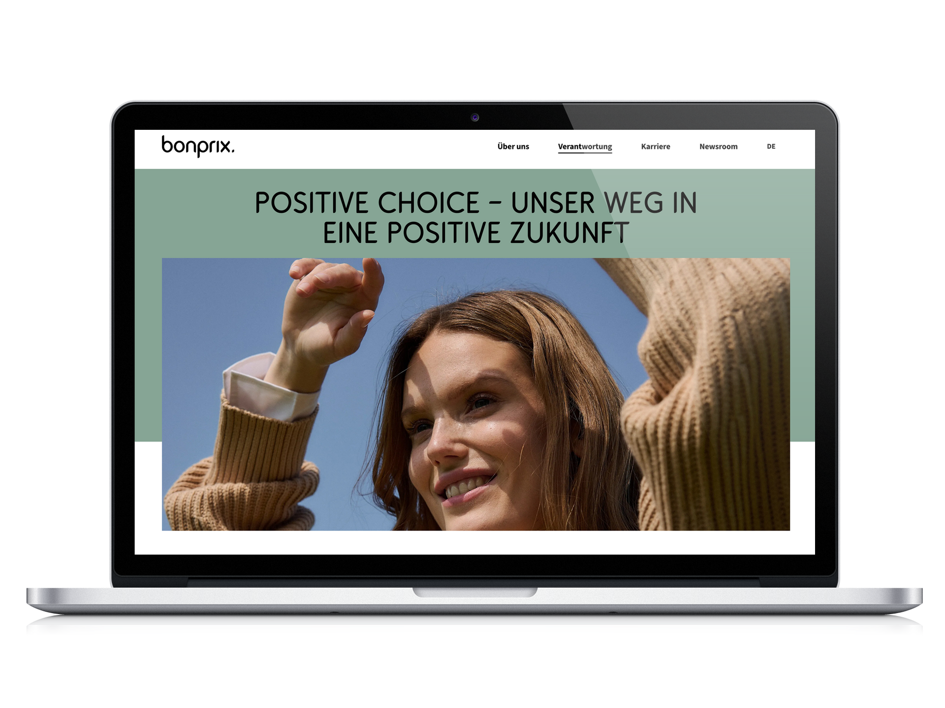 Mockup eines geöffneten Laptops mit der bonprix corporate site auf dem Bildschirm